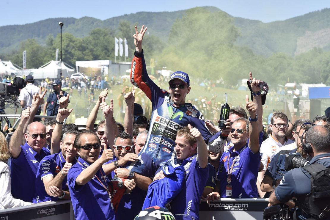 Lorenzo basks in the smoke emmanating from the crowds of Rossi fans in attendance