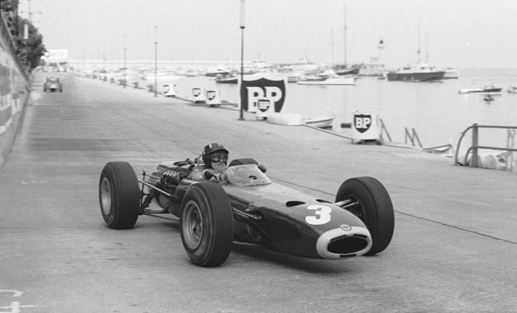 Graham Hill won in Monaco five times during an 18-year F1 career. Here he is racing during the 1965 grand prix where he was crowned champion for the third time despite having to push his car back on track and restart it after taking avoiding action up an escape road. 