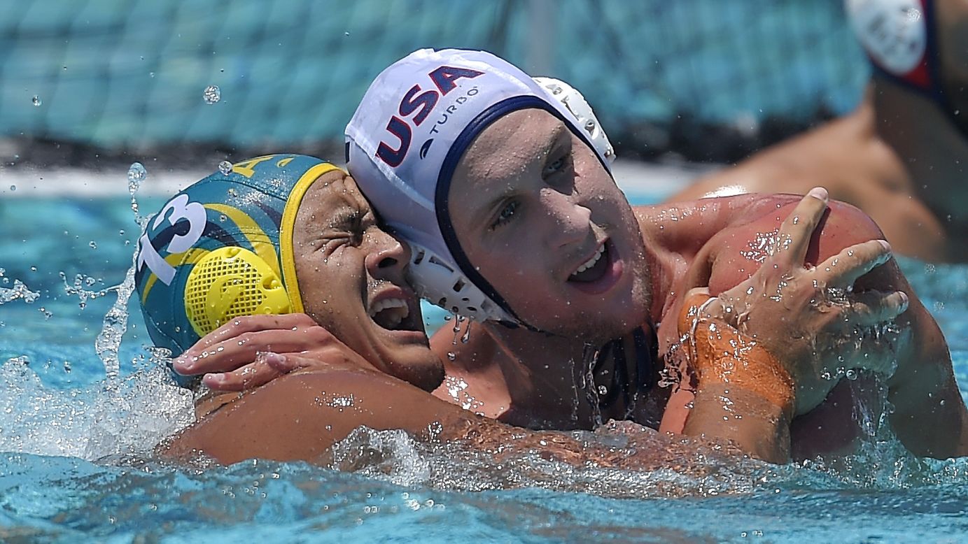Australia's Joe Kayes, left, and the United States' Alex Roelse tussle during a water polo match in Los Angeles on Sunday, May 22.