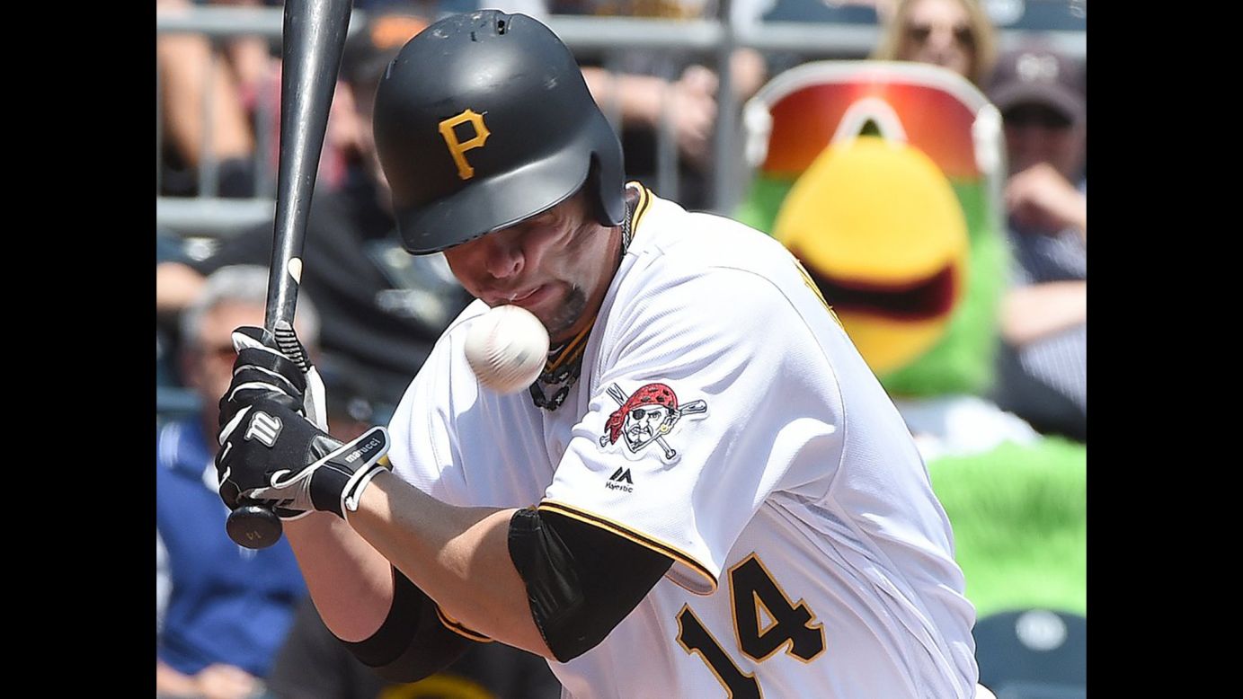 Pittsburgh's Ryan Vogelsong is hit in the face by a pitch during a game against Colorado on Monday, May 23. He was carted off the field and admitted to the hospital with a left eye injury, his team said.