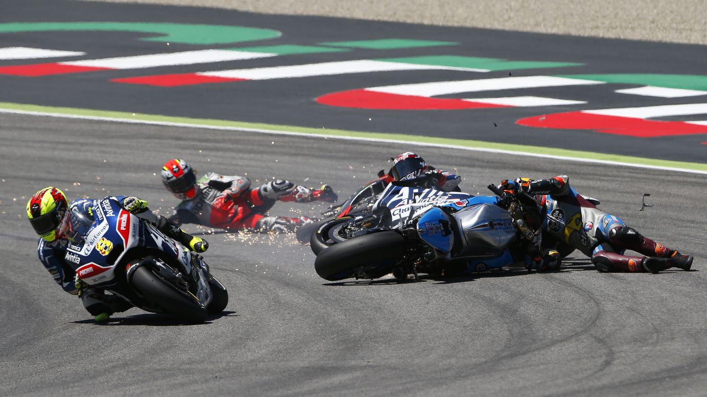 Hector Barbera, left, speeds past a first-lap crash during <a href="http://www.cnn.com/2016/05/23/motorsport/motogp-italy-valentino-rossi-vinales/index.html" target="_blank">the MotoGP race in Italy</a> on Sunday, May 22. Behind Barbera, from left, are Alvaro Bautista, Loris Baz and Jack Miller. Bautista and Miller were OK after the wreck, but <a href="http://www.eurosport.com/moto/baz-could-face-sideline-spell-after-mugello-crash_sto5582593/story.shtml" target="_blank" target="_blank">Baz suffered a broken foot.</a>