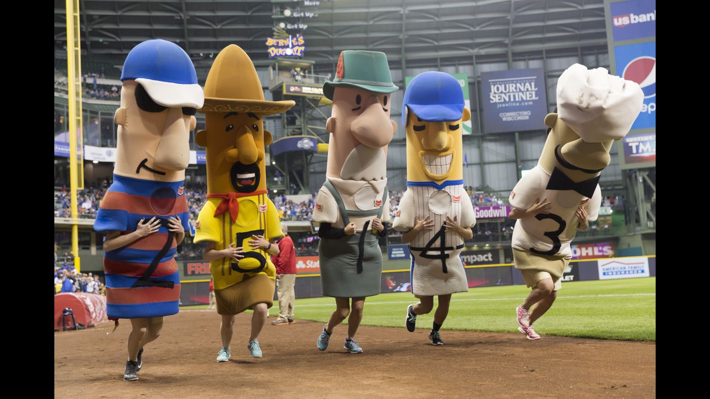 Mascots race in <a href="http://milwaukee.brewers.mlb.com/mil/fan_forum/racing_sausages.jsp" target="_blank" target="_blank">the traditional Sausage Race</a> during a Milwaukee Brewers baseball game on Wednesday, May 18. From left are Polish Sausage, Chorizo, Bratwurst, Hot Dog and Italian Sausage.