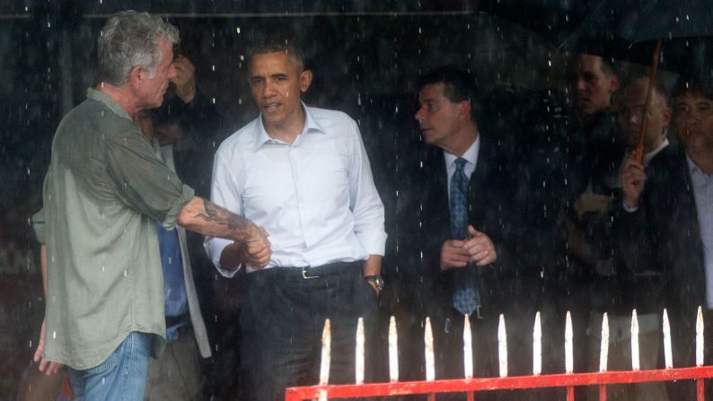 Obama shakes hands with chef Anthony Bourdain in a shopping area of Hanoi on May 24. The President sat down with Bourdain to film a scene for CNN's <a href="index.php?page=&url=http%3A%2F%2Fwww.cnn.com%2Fshows%2Fanthony-bourdain-parts-unknown" target="_blank">"Parts Unknown."</a>
