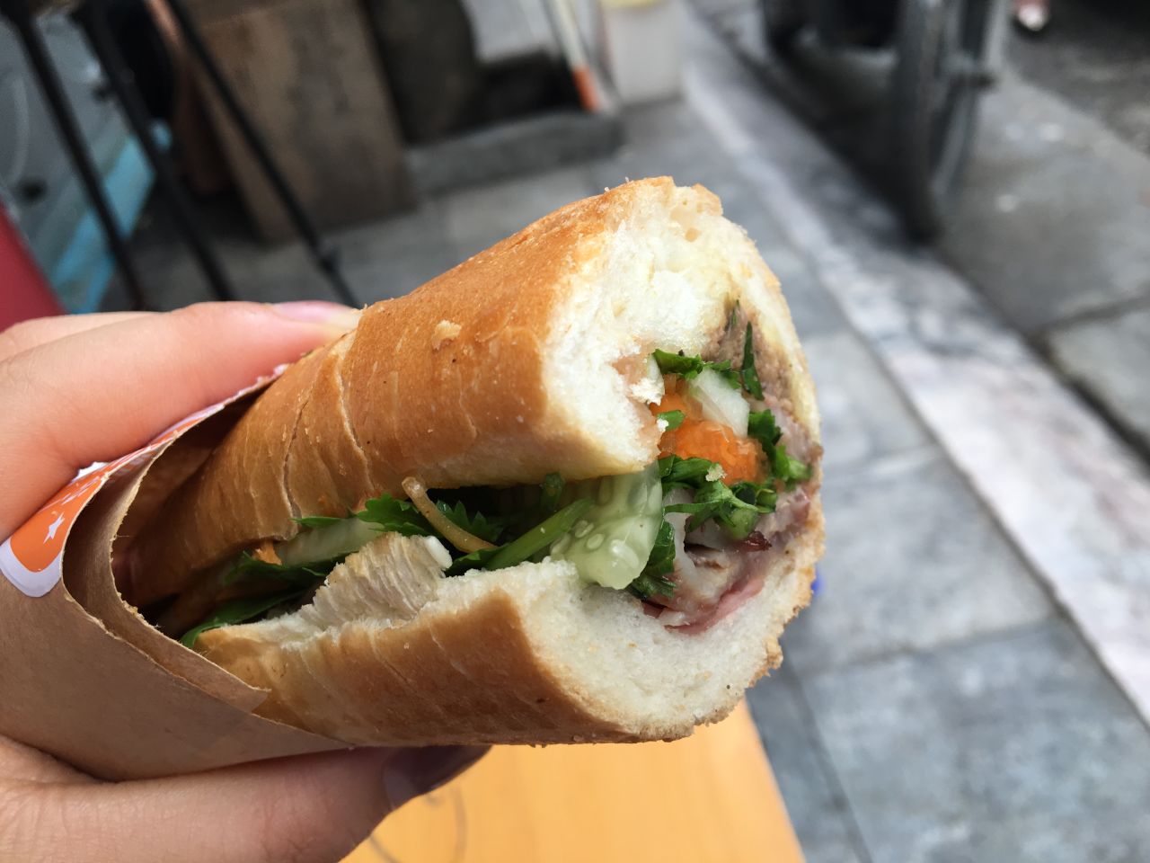 Banh mi is one of Vietnam's most famous exports. Arriving in a crispy, fresh baguette, fillings can include pickled veggies, cilantro, pork, pate, sausage and even cheese. 