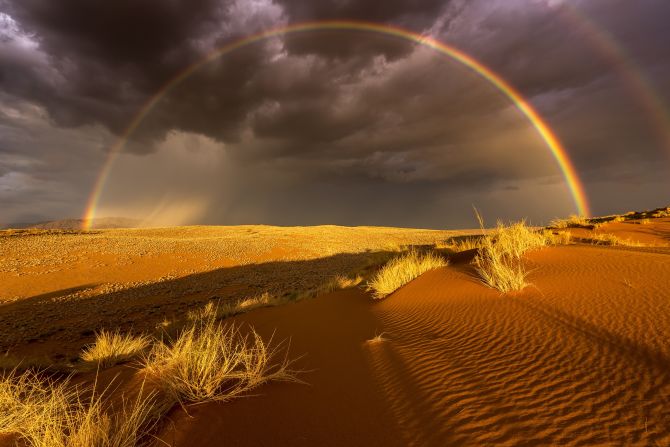 National Geographic's 2016 travel photography awards have drawn some amazing entries. These include this image of a rare thunderstorm and rainbow over Namibia's Namibrand-Park by Stefan Forster. Click through the gallery to see more entries. (<a href="http://travel.nationalgeographic.com/photographer-of-the-year-2016/" target="_blank" target="_blank">Click here to enter NatGeo photo contest</a>)