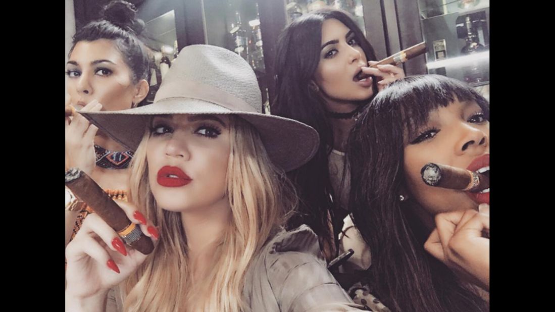 Television personality Khloe Kardashian, second from left, <a href="https://www.instagram.com/p/BFAKLFGBRgY/" target="_blank" target="_blank">smokes a cigar</a> in this selfie she posted from Cuba on Wednesday, May 4. Joining her, from left, are sisters Kourtney and Kim and friend Malika Haqq.