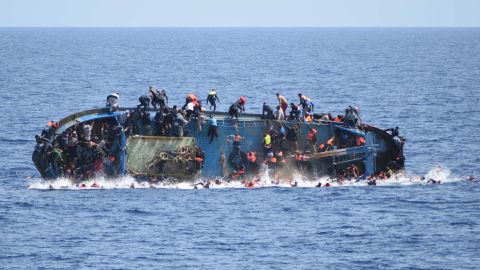 The ship was spotted Wednesday off the Libyan coast. Many people fleeing the Mideast on boats head to Italy.