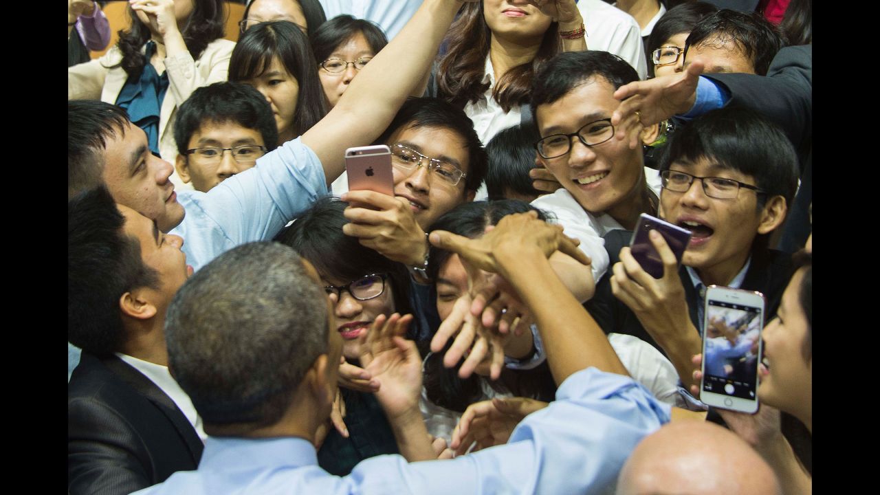 Obama shakes hands after speaking at a town-hall event in Ho Chi Minh City, Vietnam, on May 25.