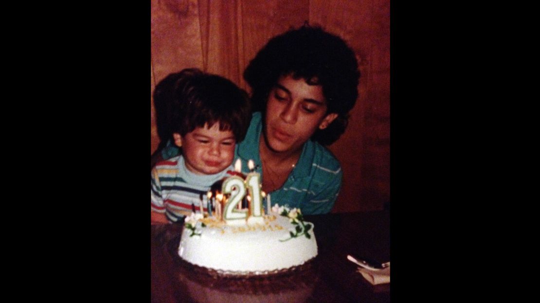 Debbie Franczek blows out the candles on her 21st birthday with her son, Matt.