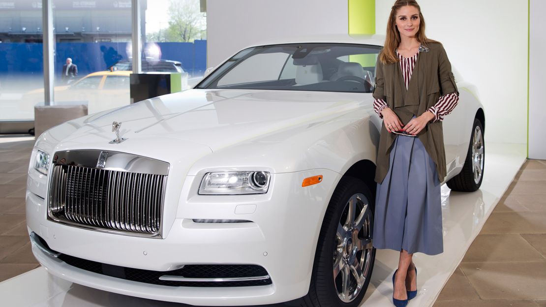 Don't forget the car! That custom luggage fits perfectly in the trunk of the Rolls-Royce Wraith, appreciated here by New York socialite Olivia Palermo.