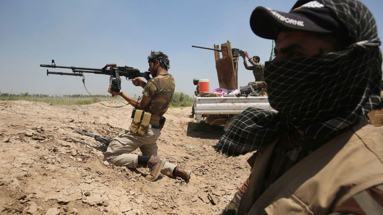 Iraqi government forces take position east of Falluja on Wednesday, May 25.