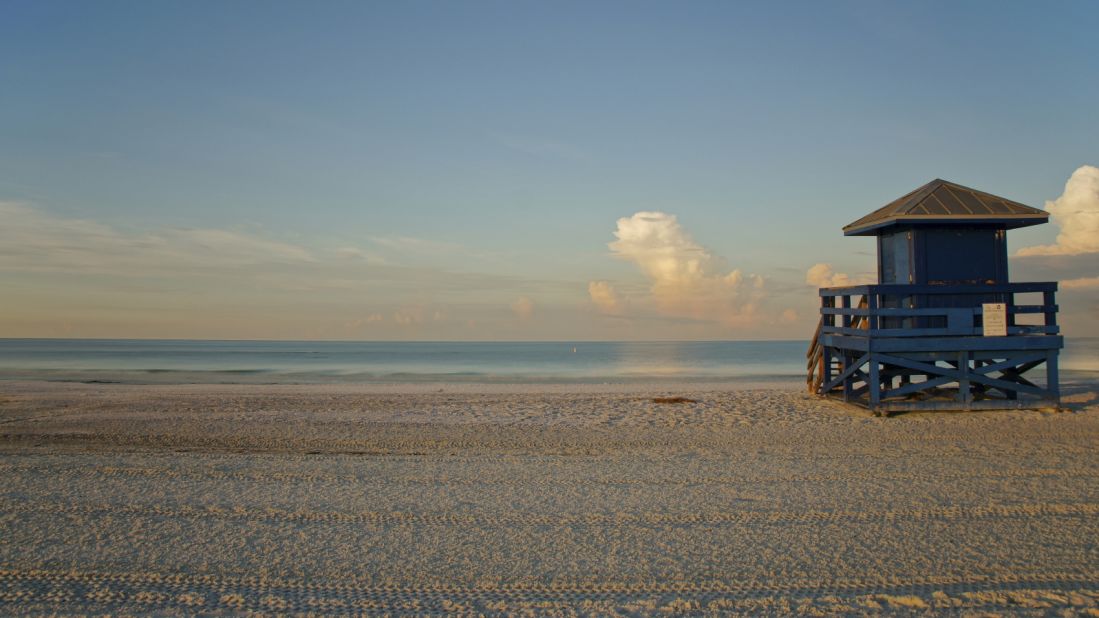 Siesta Beach in Sarasota, Florida, has some of finest white sand and calmest, clear water in the country. 