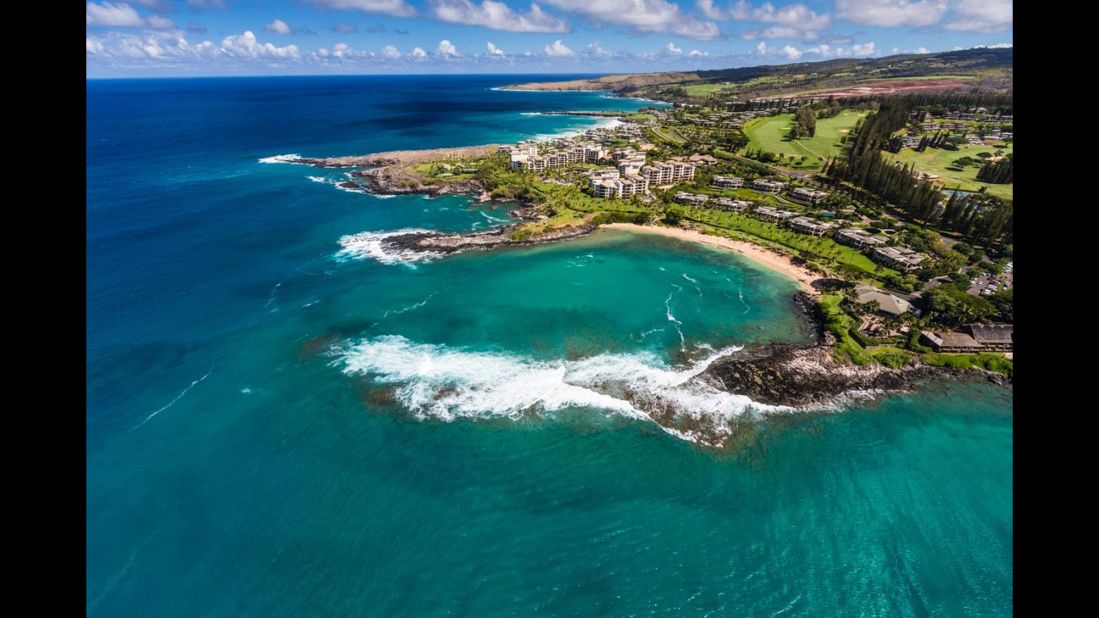 The snorkeling area at Kapalua Bay Beach on Maui, Hawaii, is protected by two headlands formed by lava flows into the sea.