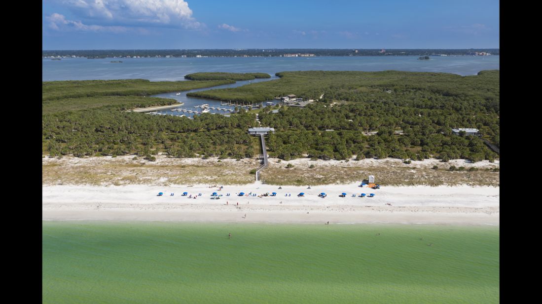 Caladesi Island State Park in Florida is reached by a long walk from Clearwater  Beach, pedestrian ferry or private boat. The beach is crystalline quartz white sand but the big fun is the kayak and canoe trails through the mangroves.