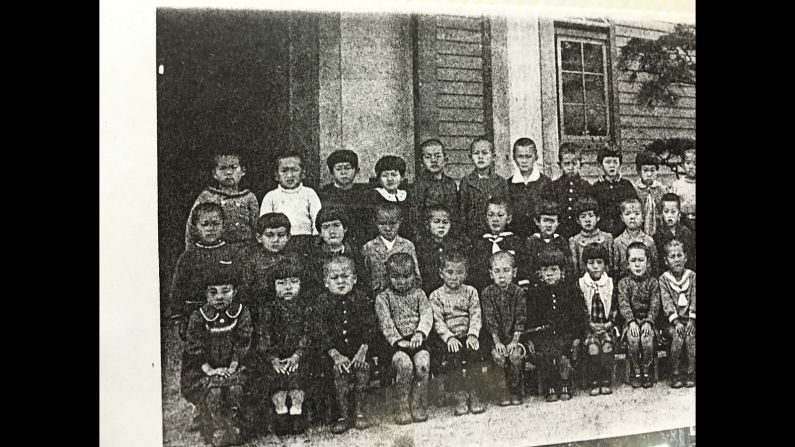 Mori pictured at primary school, top row left. This is his only childhood photo that survived the A-bomb blast.