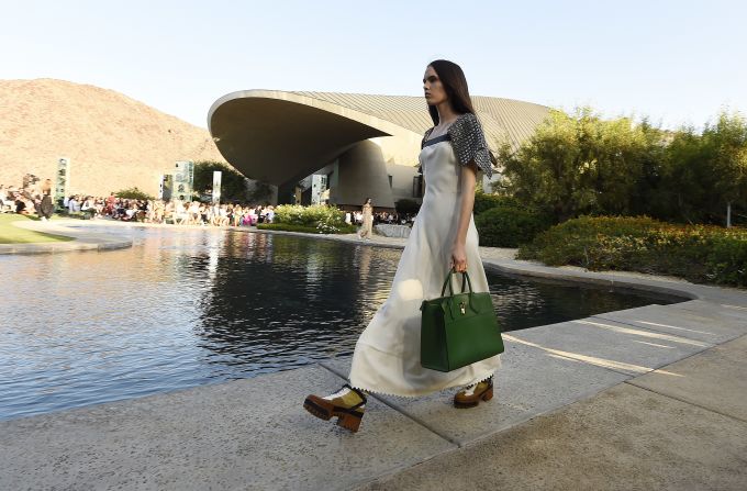 Designed by John Lautner, knwon for his Space Age, mid 20th century Southern Californian houses, the estate formerly belonging to Bob and Delores Hope was an extraordinary and rarely seen setting. Kanye West, Catherine Deneuve, Charlotte Gainsbourg and Michelle Williams were all in attendance.