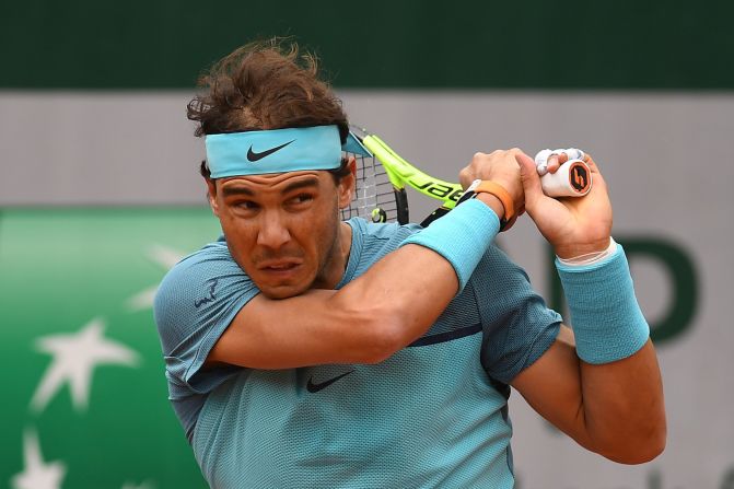 Rafael Nadal picked up his 200th grand slam win by easing past Argentina's Facundo Bagnis 6-3 6-0 6-3. 