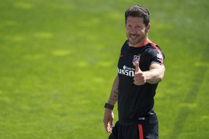 Atletico's head coach Diego Simeone gives the thumbs up during training ahead of the final. The team plays in the Argentine's image -- dogged, relentless and tenacious. Under him it broke the stranglehold of Barcelona and Real Madrid to win the Spanish League title in 2013.