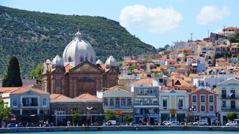 The church of Agios Therapon dominates the skyline in Lesbos's capital Mytilene. Islanders are looking at new ways to encourage tourists scared away by headlines about the migrants.