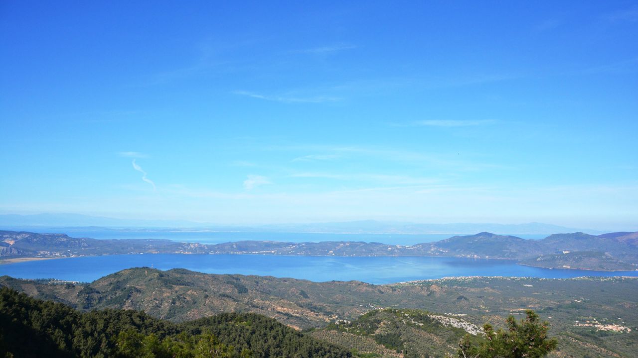 A sea view from the hiking trails of Mount Olympus, the second highest peak in Lesbos. Most cruise ships have diverted from the island and some travel companies have stopped offering vacation packages altogether.