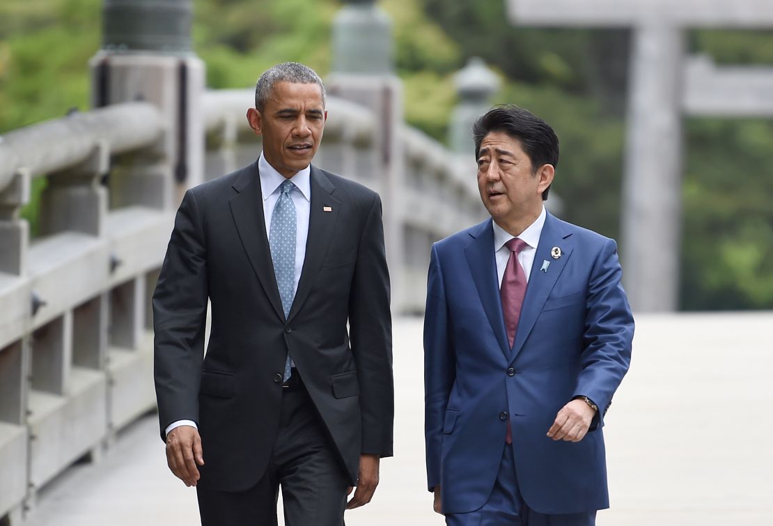 US President Barack Obama walks with Japan's Prime Minister Shinzo Abe as they arrive at Ise-Jingu Shrine in the city of Ise in Mie prefecture, on May 26.
