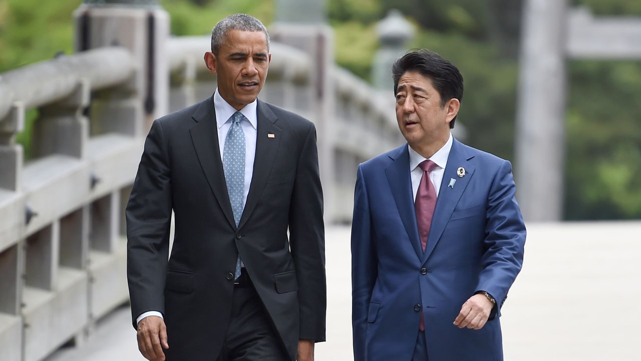 US President Barack Obama walks with Japan's Prime Minister Shinzo Abe as they arrive at Ise-Jingu Shrine in the city of Ise in Mie prefecture, on May 26.