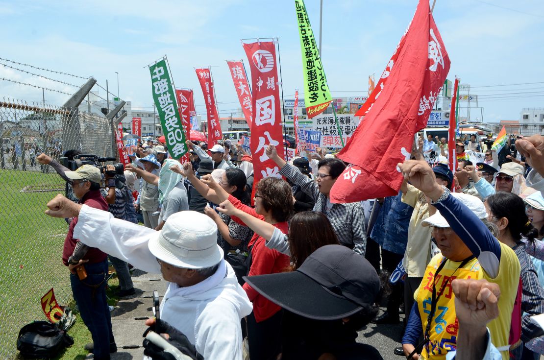 People protest against the U.S. military presence at the U.S. Kadena Air Base in Cyatan, Okinawa prefecture,   May 21, 2016. 