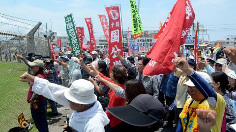 People protest against the U.S. military presence at the U.S. Kadena Air Base in Cyatan, Okinawa prefecture, May 21, 2016.