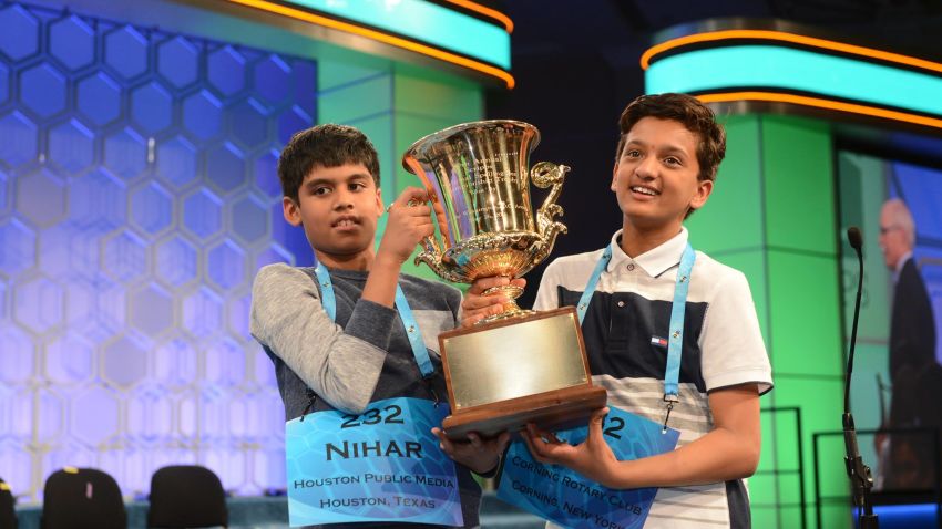 Co-champions Nihar Janga and Jairam Hathwar hold the 2016 National Spelling Bee trophy