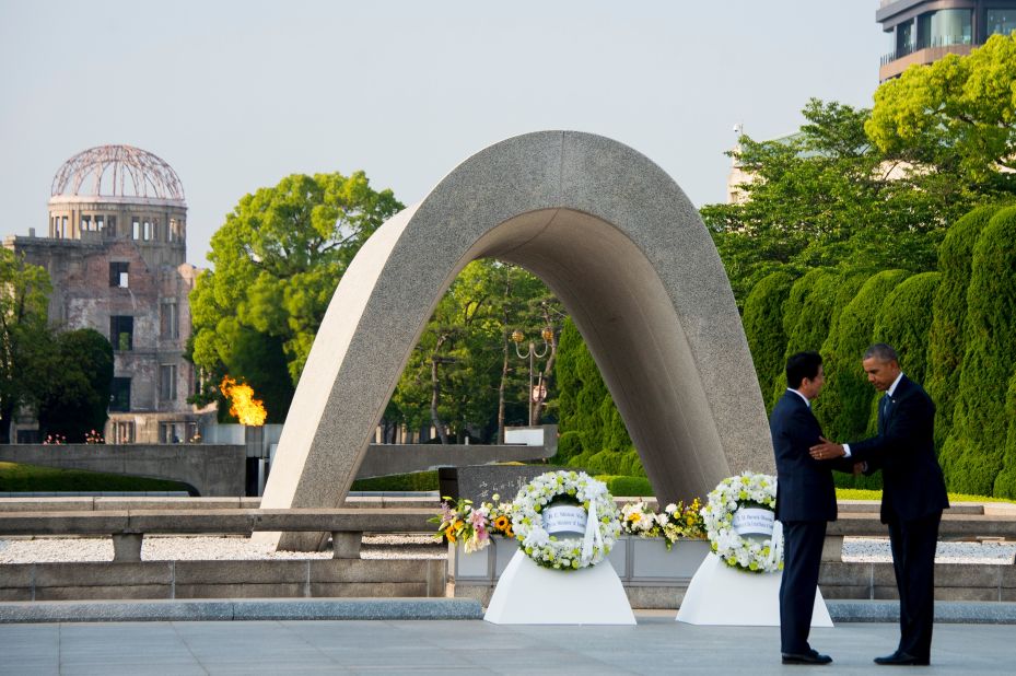 President Obama, right, and Japanese Prime Minister Shinzo Abe shake hands after laying wreaths at the Hiroshima Peace Memorial Park in Hiroshima on May 27. Obama is the first sitting U.S. president to visit Hiroshima.