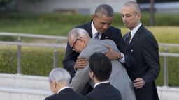 U.S. President Barack Obama hugs Shigeaki Mori, an atomic bomb survivor; creator of the memorial for American WWII POWs killed at Hiroshima, during a ceremony at Hiroshima Peace Memorial Park in Hiroshima, western Japan, Friday, May 27, 2016. Obama on Friday became the first sitting U.S. president to visit the site of the world's first atomic bomb attack, bringing global attention both to survivors and to his unfulfilled vision of a world without nuclear weapons. (AP Photo Carolyn Kaster)