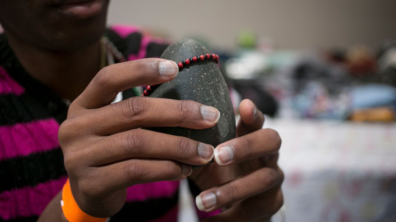 It's heavy, but Angel Bornell Batista, 27, didn't think twice about packing a sacred Eleguá stone when she left Cuba a year ago, or bringing it along on the three-month journey from Ecuador to the United States. "I asked him to clear the path for me," Bornell said.