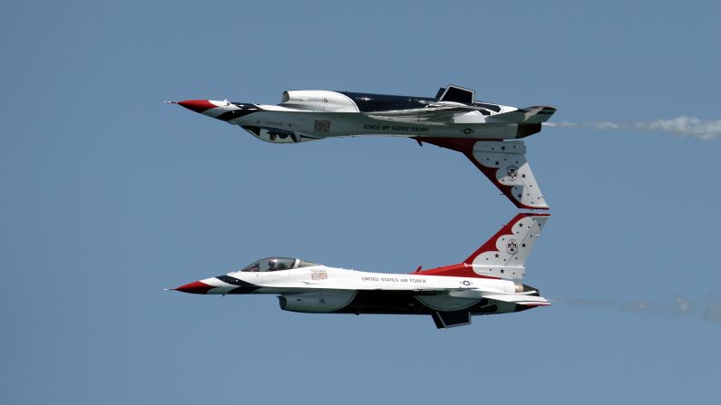 A couple of the U.S. Air Force Thunderbirds practice Saturday, May 7, before an air show in Fort Lauderdale, Florida.