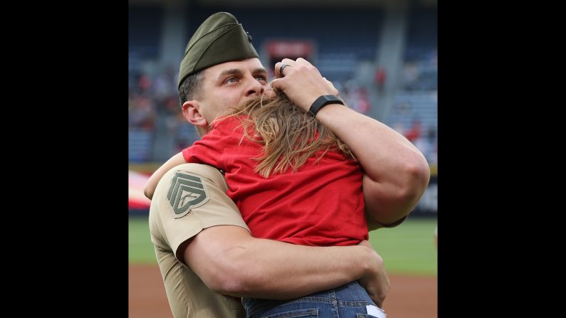 Marine Staff Sgt. Clayton Walker is moved to tears after <a href="index.php?page=&url=http%3A%2F%2Fwww.cnn.com%2Fvideos%2Fliving%2F2016%2F05%2F13%2Fmarine-surprises-daughter-baseball-game-orig-vstan-jhurst.cnn" target="_blank">he surprised his 10-year-old daughter, Cassidy,</a> at a Major League Baseball game in Atlanta on Wednesday, May 11. He had been deployed for 11 months.