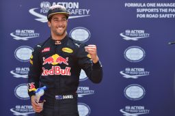 Ricciardo celebrates after topping the charts in qualifying.