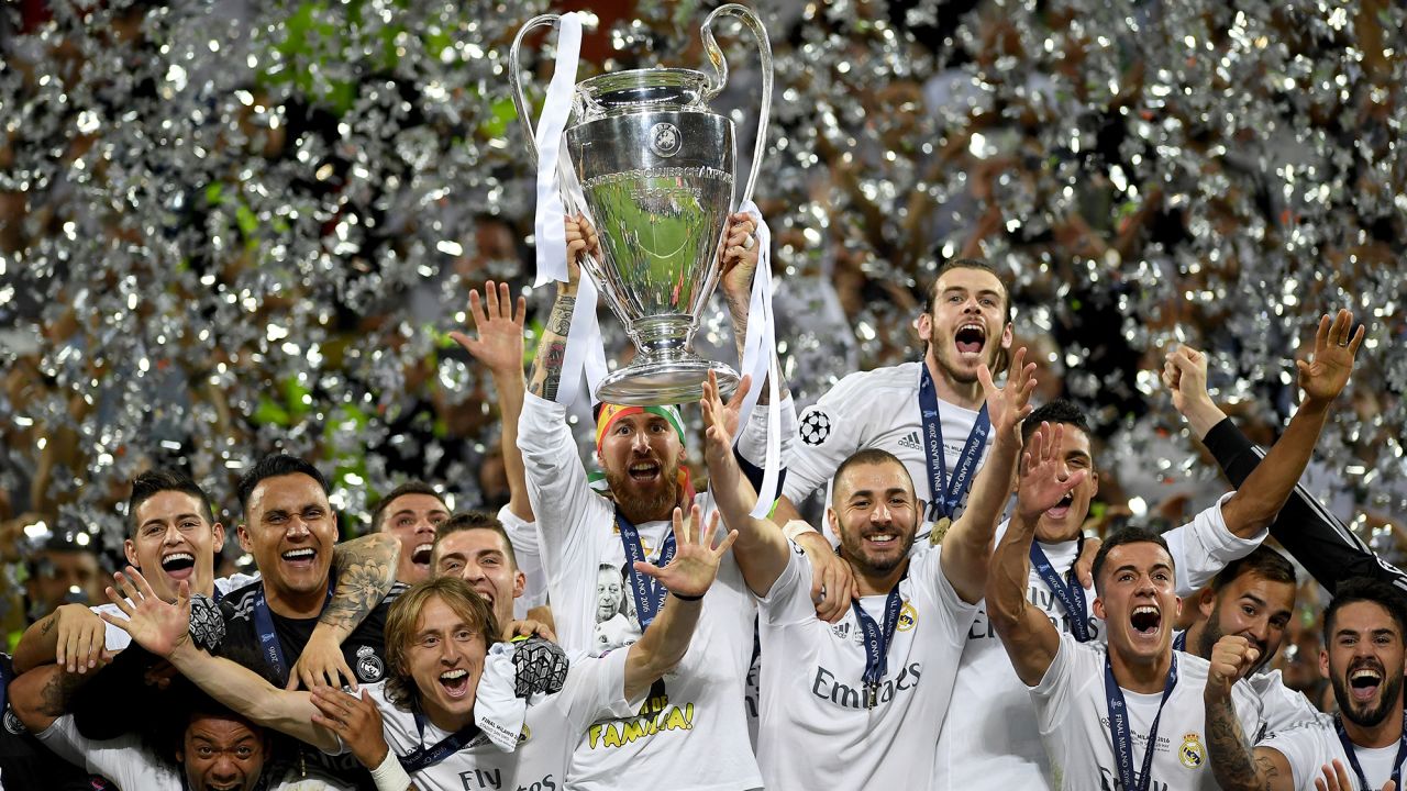 Real Madrid won its 11th European Cup after beating city rival Atletico Madrid on May 28 at San Siro Stadium in Milan, Italy. Regulation time ended in 1-1 draw, but Real Madrid won 5-3 on penalty kicks. Sergio Ramos lifts the Champions League trophy as his teammates celebrate around him. 