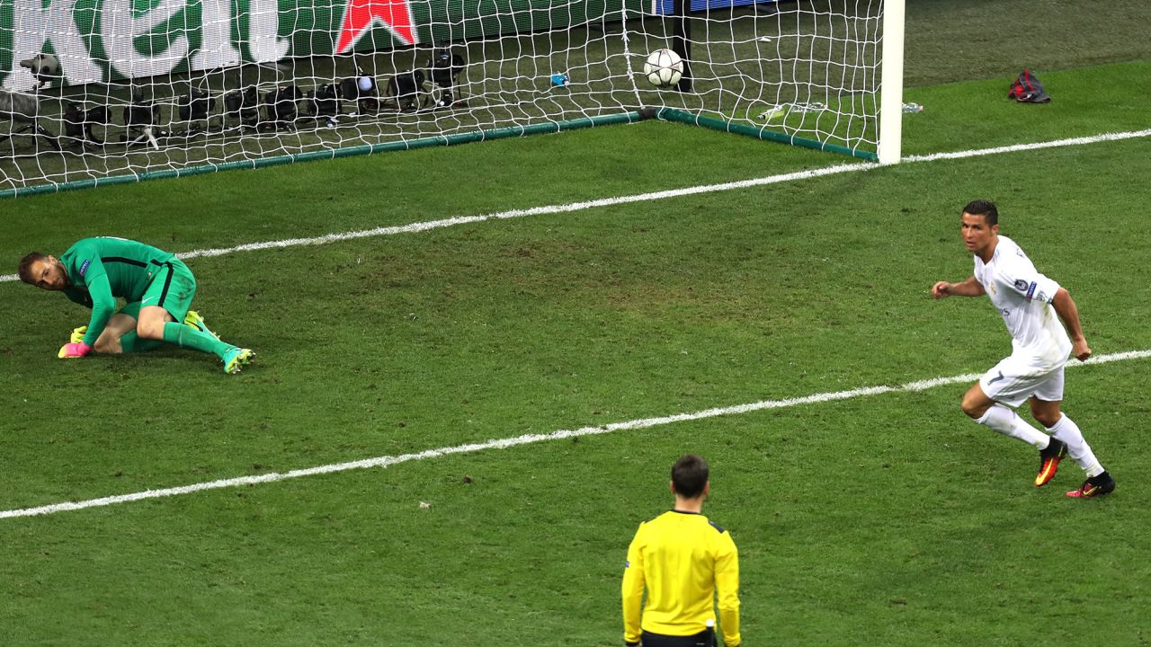 Real Madrid's Ronaldo scores the decisive penalty kick to win the Champions League final soccer match. 
