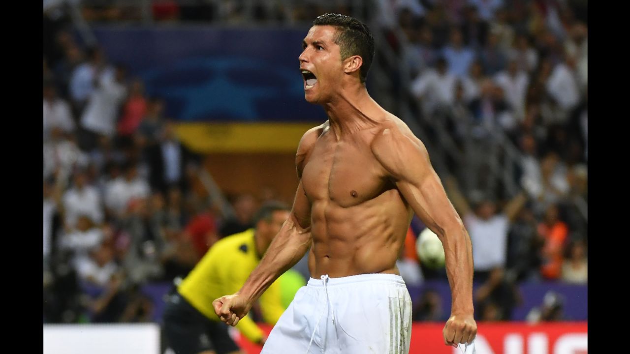 Ronaldo celebrates after making the decisive penalty kick to win the match.  