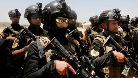 Iraqi forces gather ahead of an operation to retake Falluja on Sunday, May 29.