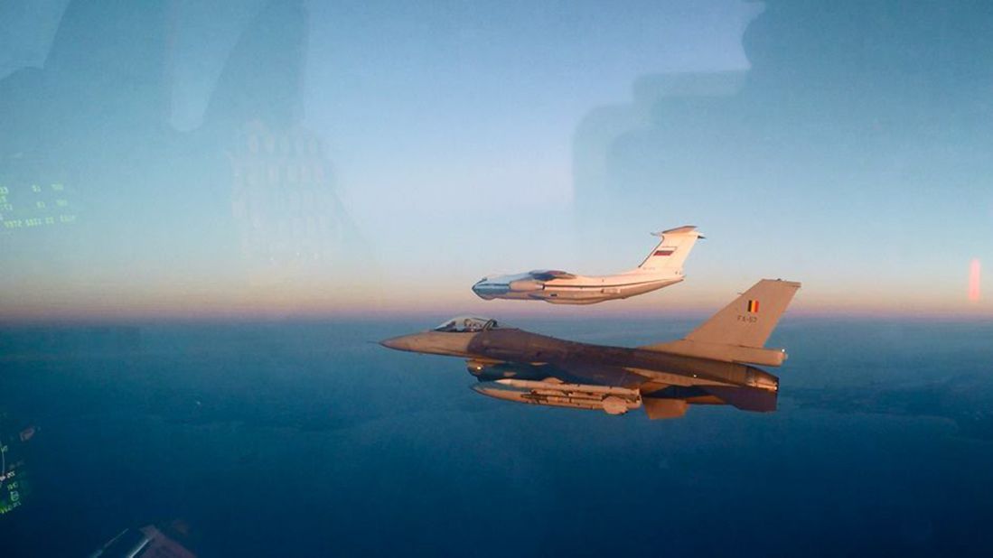 A Belgian F-16 shadows a Russian Il-76.