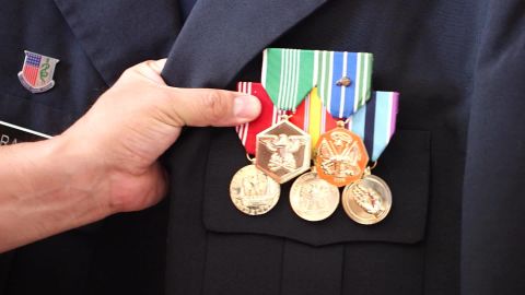 Deported veteran Hector Barajas still wears the medals he earned serving in the US military.