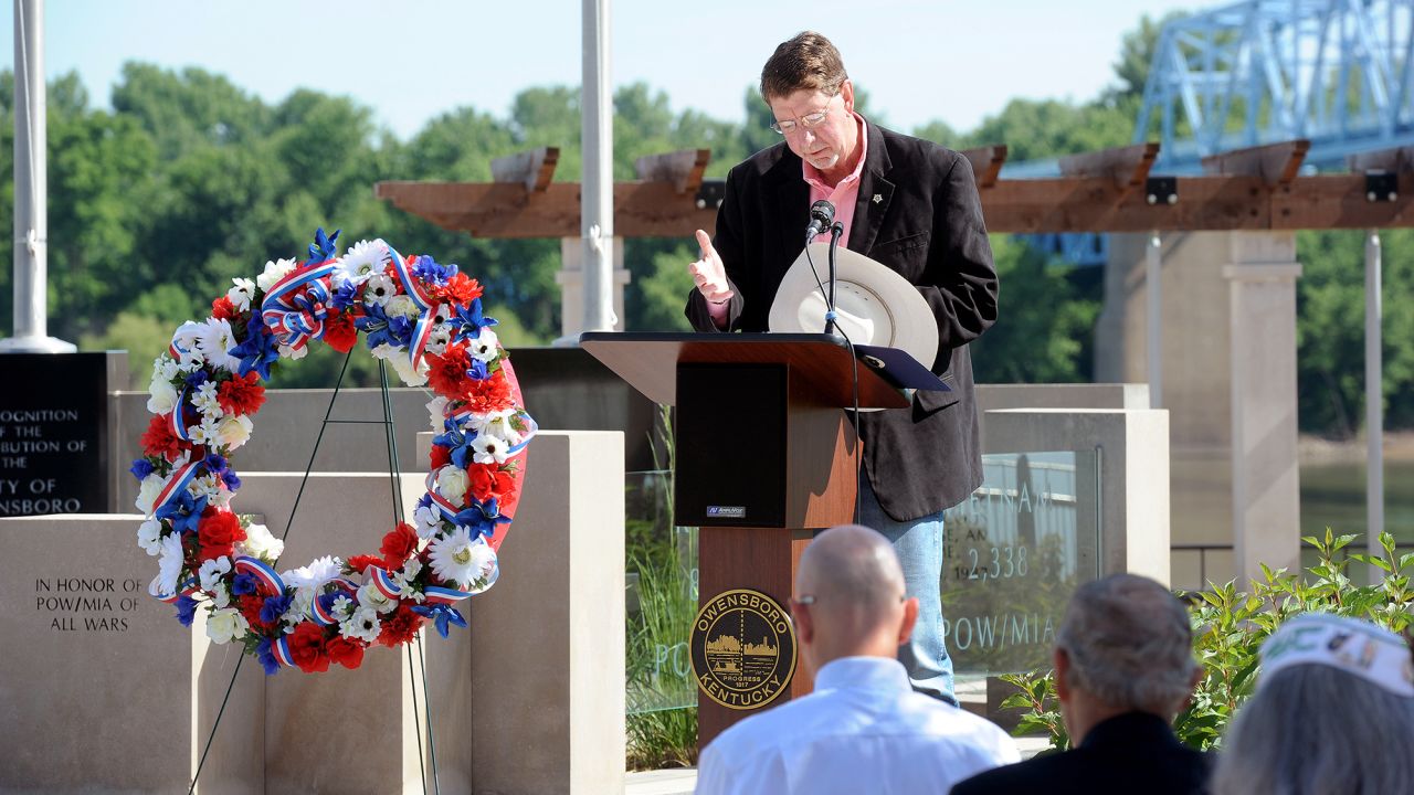 Daviess County Sheriff Keith Cain leads a prayer May 30 at the Charles Shelton Memorial in Owensboro, Kentucky.