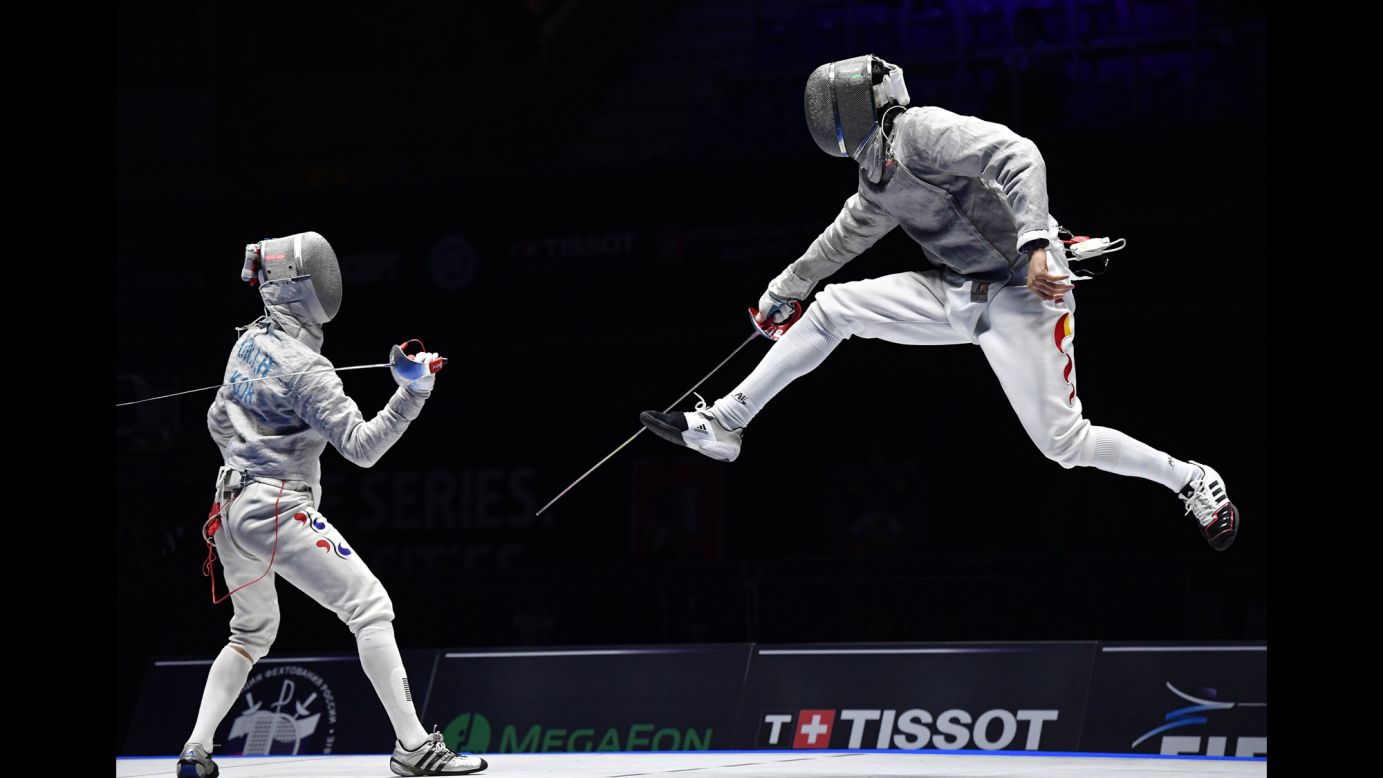 Chinese fencer Yingming Xu, right, competes against South Korea's Kim Jung-hwan in the Moscow Grand Prix's sabre final on Saturday, May 28. Kim won 15-7.