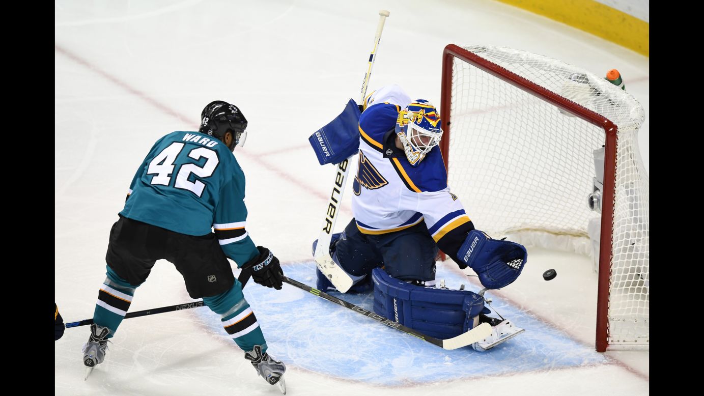 San Jose's Joel Ward slips the puck past St. Louis' Brian Eliott during Game 6 of the NHL's Western Conference Final on Wednesday, May 25. Ward had two goals in the series-clinching game, a 5-2 Sharks victory.