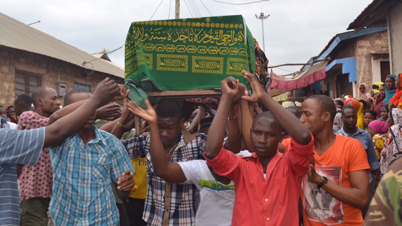 The coffin of Sergeant Juma Zahoro, who died at El Adde, is carried to his funeral in Mombasa.