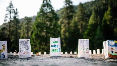 As part of an empowerment ceremony, campers can decorate luminaries with messages for loved ones.