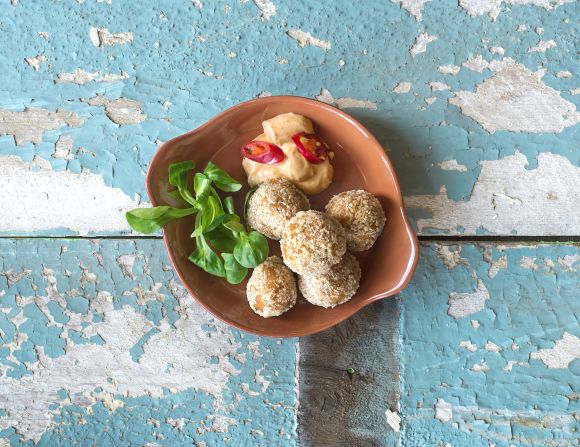 Fried yam balls are also on the menu at Zoe's Ghana Kitchen. Adjonyoh puts her own spin on traditional Ghanian recipes, inspired by the famous Kaneshi street market in Accra. 