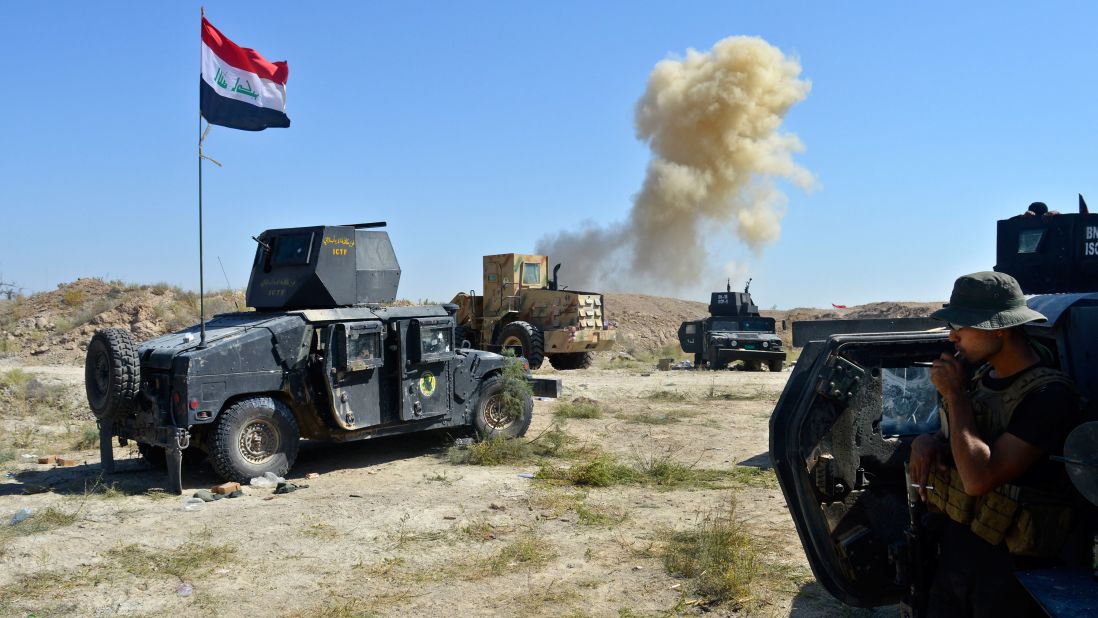 Smoke rises as Iraqi forces face off with ISIS militants on the southern edge of Falluja on Tuesday, May 31.