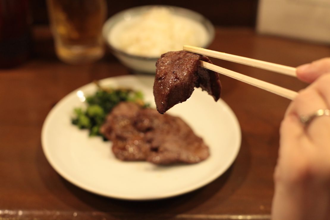 A slice of Aji Tasuke's perfectly seasoned beef tongue. 
