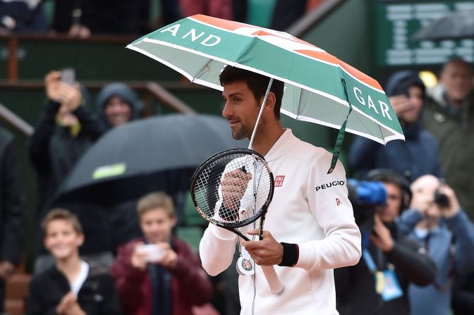 Novak Djokovic took matters into his own hands prior to his rain-affected match against  Roberto Bautista-Agut, as the weather continued to disrupt play at the French Open.